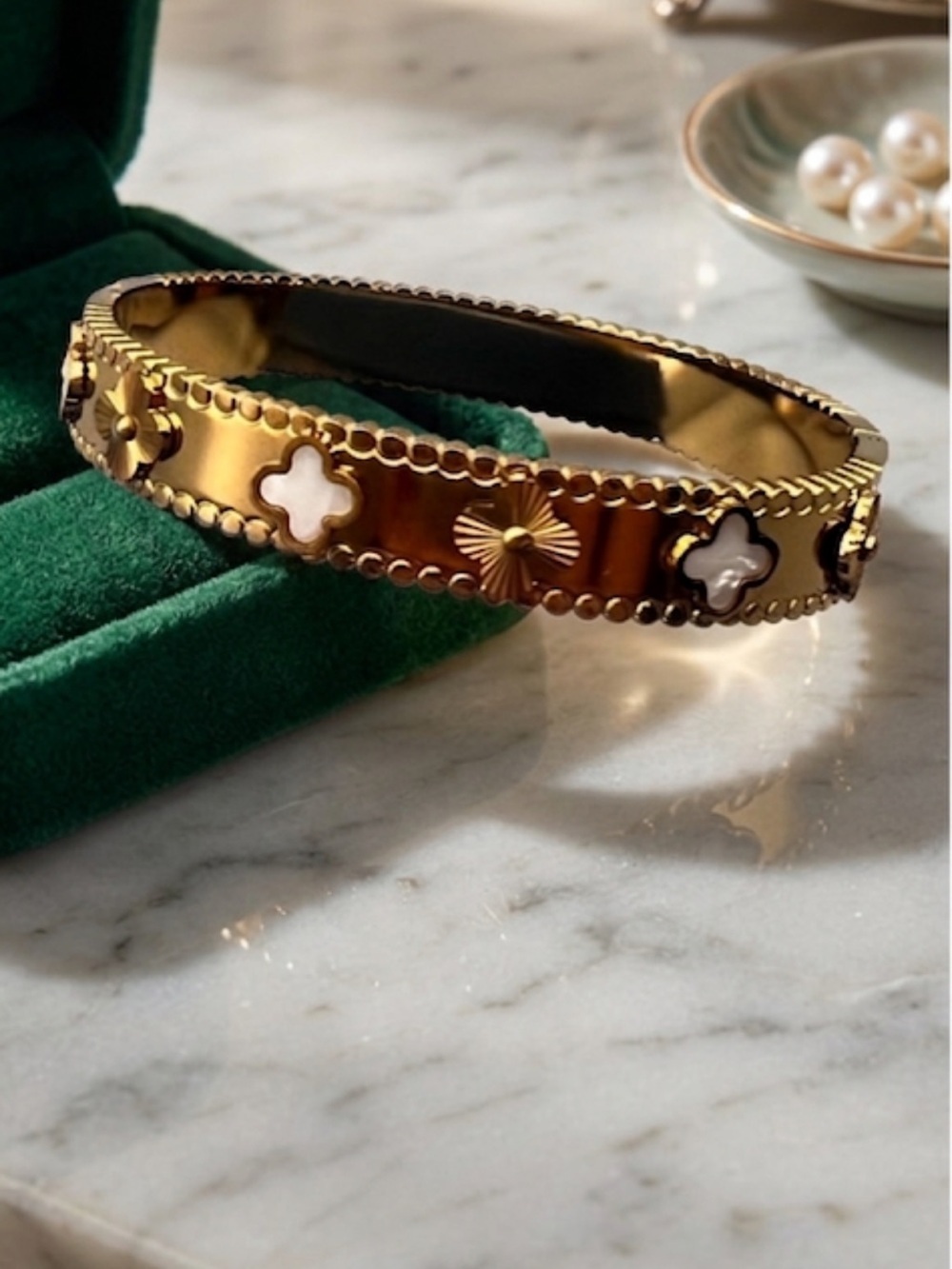 Stainless steel gold-tone clover Bangle